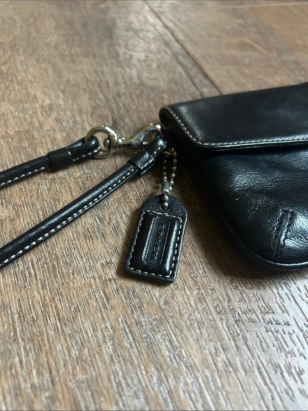 Coach sleek black